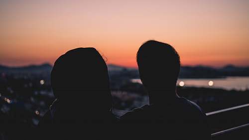 greece silhouette of two person sunrise