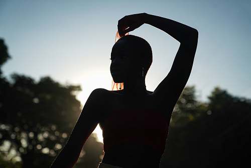 human silhouette of woman during daytime back