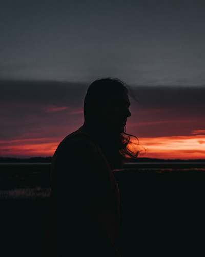 nature silhouette of woman near mountain outdoors