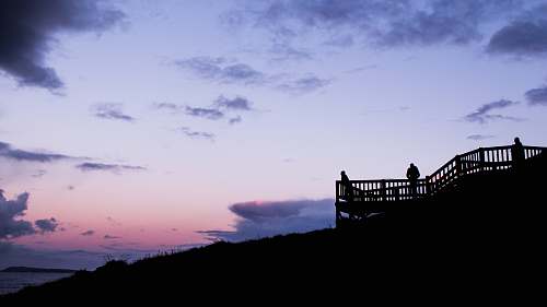 sunset silhouette person on black stair sunrise