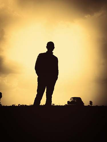 standing silhouette photography of man human