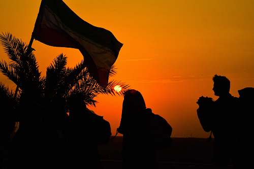 person silhouette photography of people during golden hour human