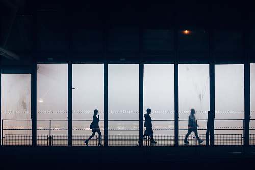 human silhouette photography unknown persons walking person