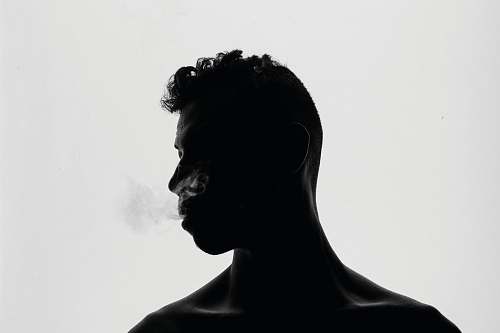 black-and-white topless man looking side view head