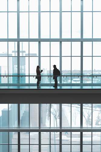terminal two person talking to each other airport terminal