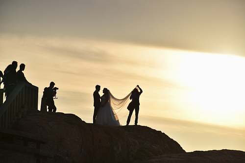 portugal wedded couple on boulder capela do senhor da pedra