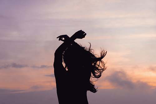 nature woman waving her hair outdoors