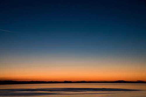 sunrise landscape photo of seashore during golden hour sunset