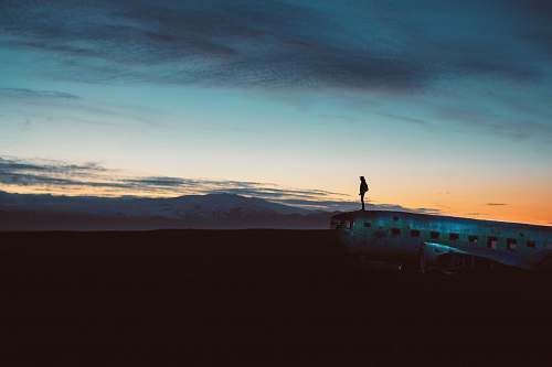 sunset silhouette of a person during sunset sunrise