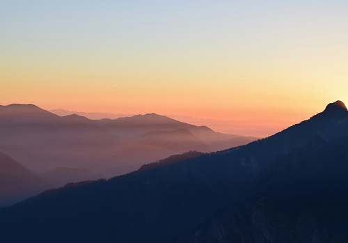 sunrise aerial photography of mountain sky