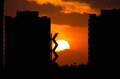 nature silhouette photography of buildings outdoors