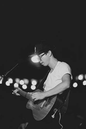 guitar man holding guitar music