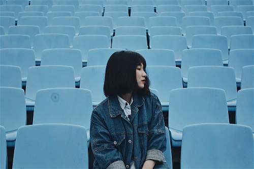 people woman sitting on chair human