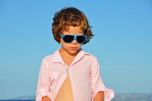 person child facing down during daytime people
