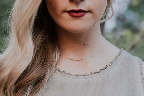 people closeup photography of woman in gray shirt person