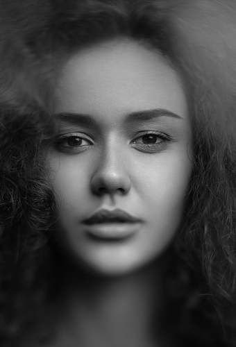 person grayscale woman taking selfie black-and-white