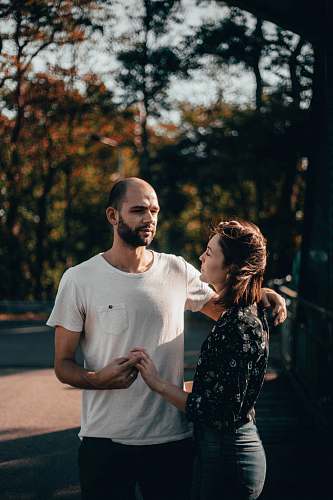 people man and woman holding hands person