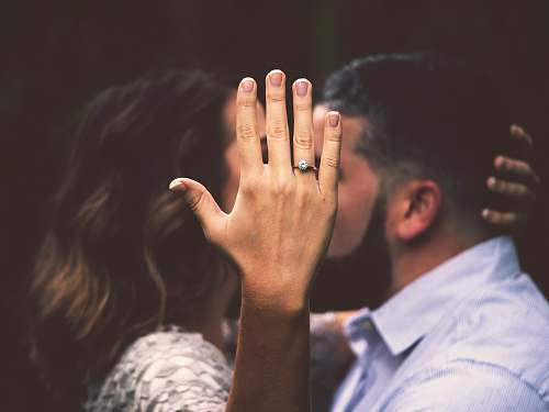 people man and woman kissing person