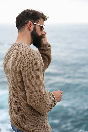 people man holding his sunglasses person