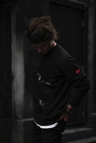 person man standing gray concrete wall people