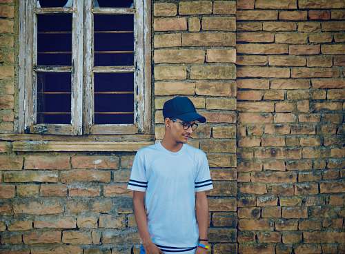 person man standing in-front wall people
