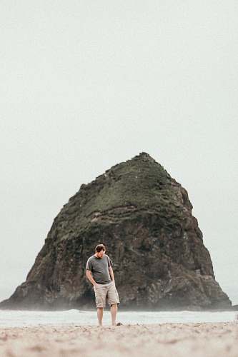 people man standing on beach person