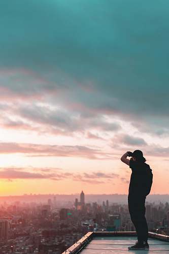 people man standing on concrete building person