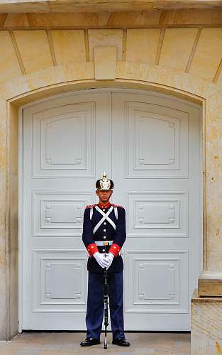 people man standing on white door person