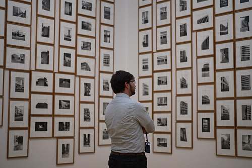 people man starring at photos person