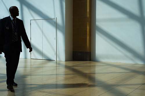 people man walking on hallway person