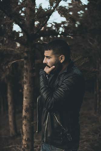 people man wearing black leather jacket person