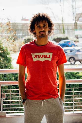 people man wearing red Levi's T-shirt person