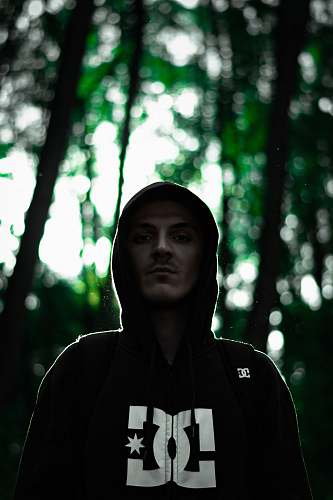 people men's black and white DC Shoes zip-up drawstring hoodie person