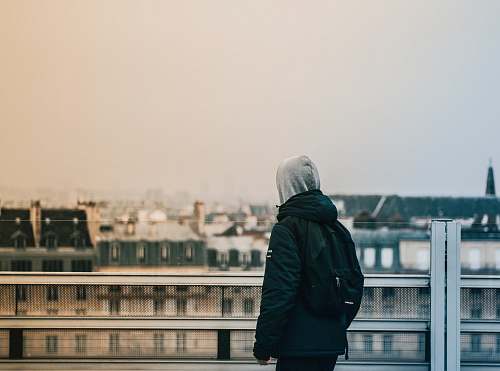 person person standing in front of building people