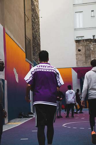 people person wearing purple and white T-shirt person