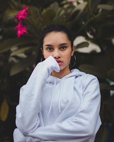 people portrait photography of woman in white pullover hoodie person