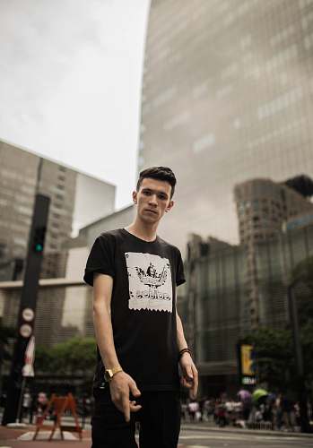 people shallow focus of man wearing blackcns person