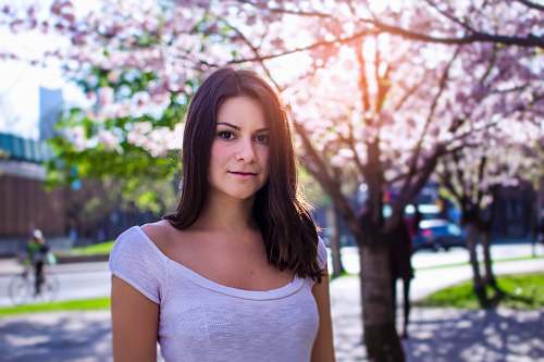 people shallow focus photography of woman wearing gray top person