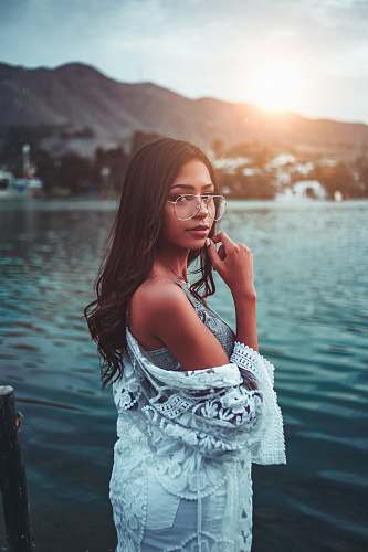person standing woman on dock people