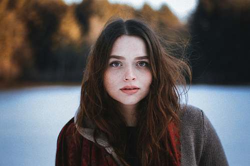 person tilt shift lens photography of woman people