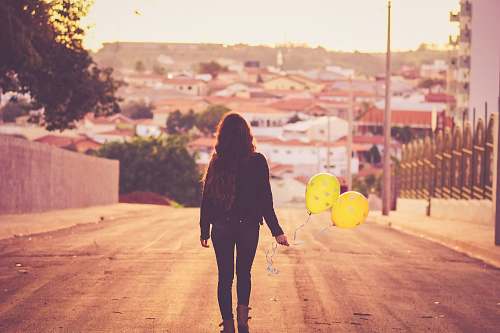 people woman holding balloon person
