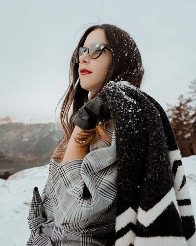 people woman holding black coat person