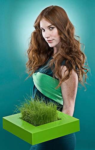 people woman holding green grass person