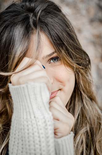 people woman holding her face person