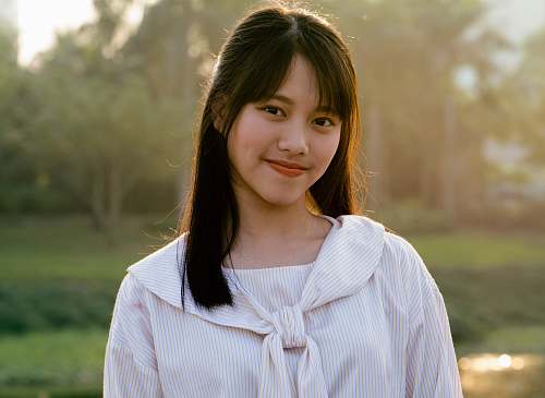 people woman in white striped top person