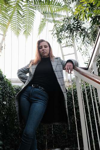 people woman near green leafed plants person