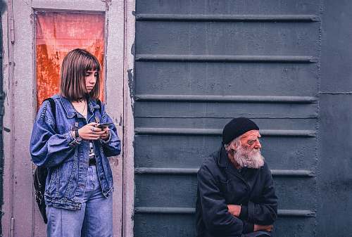 people woman near man sitting during daytime person