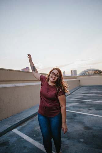 person woman on top of building people