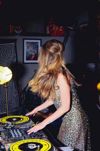 people woman playing mixer at night person