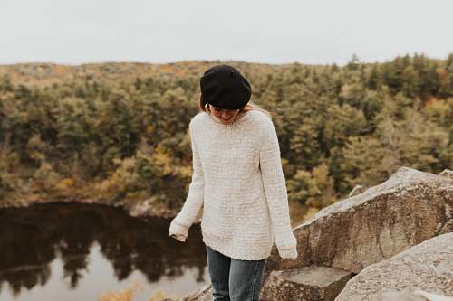 people woman standing near cliff person